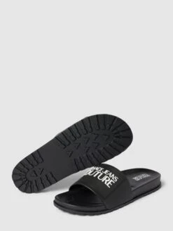 Versace Jeans Couture Slides Mit Label-Detail Modell 'FONDO' - Schwarz -Herrenbekleidung Angebote 6ko52c2m9l83ggq69h14egil6gq42iq89d93gdif8954ihi28ta3ehpj60p4aipp84o30gi99sr54d1oaco3cchp74pmcd1hc9gm6p1k70r36ob1c8q38or1cosm6p9hchh62c0
