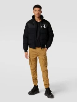 Calvin Klein Jeans Steppjacke Mit Label-Print Modell 'CUT OFF CK MIX MEDIA PUFF' - Schwarz