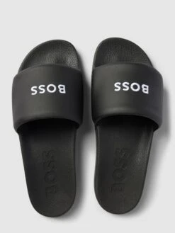 BOSS Slides Mit Label-Stitching Modell 'Reese' - Schwarz -Herrenbekleidung Angebote 90rjih1j8sp36c25ap43gj276t95cja88oo3ie1p6l1kmci26l2kedi99l4l0e9na5234lhlah5k6hpm9h3j8e31c8s34opl74o32p1kchhm2ohkchij2cb16gojgob6cpij8d0
