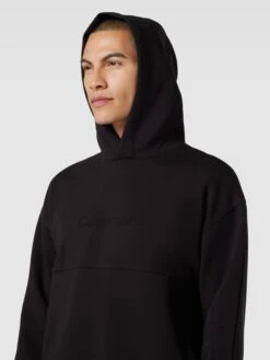 CK Calvin Klein Hoodie Mit Logo-Print Modell 'COMFORT' - Schwarz -Herrenbekleidung Angebote a193ccal9p134ca78d4l6k1galal2hqd9t45aci89taj0j28aopj2chn6t25cdhl88qkuj2l9sq4giaj9so30oppc8pjee1p70q34dpk6hgjee3161j32cpkchijgohm6lj3ado